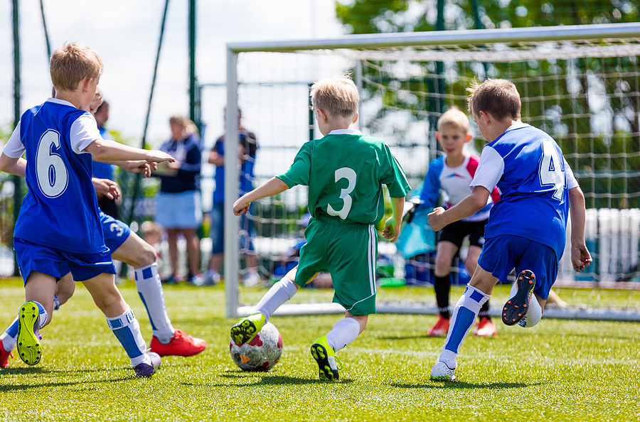 Kids playing football